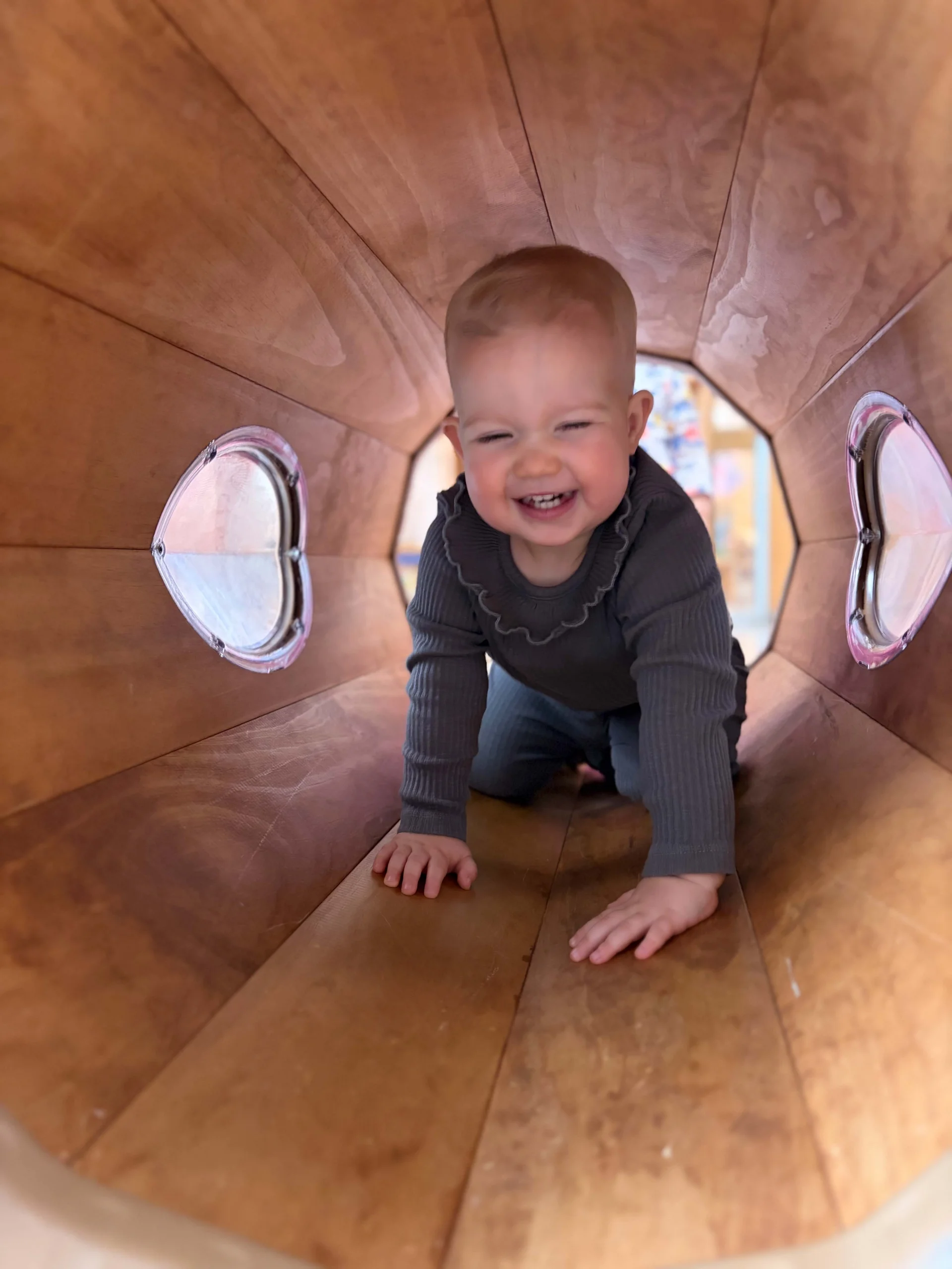 baby playing outside at danbury daycare