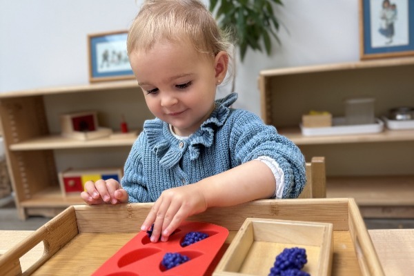 toddler in their montessori preschool classroom in danbury ct