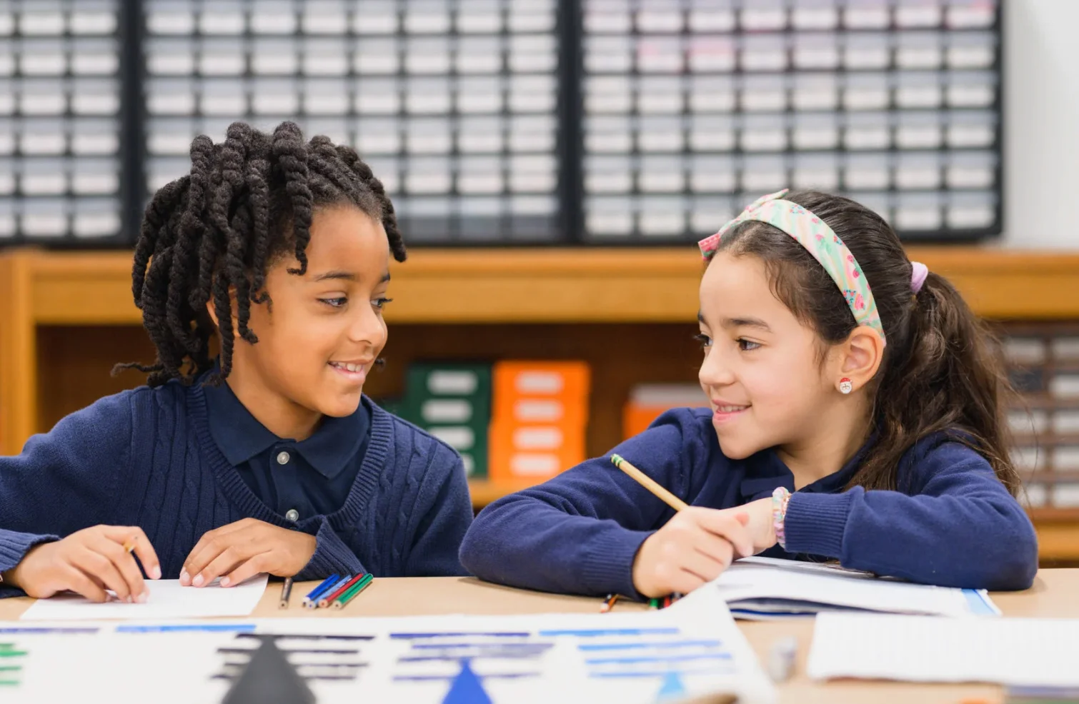 private elementary school students working in class and having fun