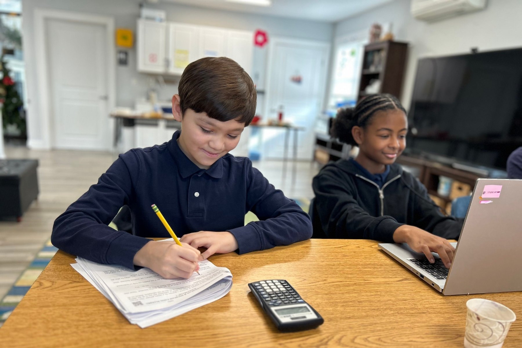 happy middle schoolers learning in their classroom in danbury